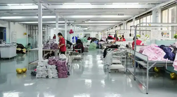 Hospital procurement team reviewing patient clothing fabric samples and documentation - patient clothes